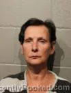 Mugshot of SABRINA LOUISE COX booked in Cleveland County, Oklahoma on May 25, 2026
