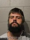 Mugshot of Travis Lee Gilmore booked in Cleveland County, Oklahoma on August 22, 2026