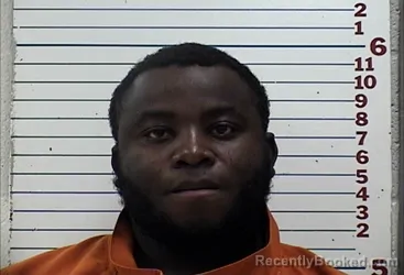 Mugshot of AFEEZ AKINOLA AMUSAN booked in Comanche County, Oklahoma on April 26, 2026