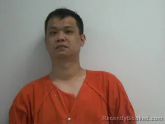 Mugshot of Weiliang Na He booked in Creek County, Oklahoma on August 12, 2026