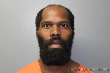 Mugshot of GARLAND RAY MBANEME booked in Custer County, Oklahoma on April 16, 2026