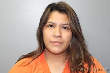 Mugshot of MONIQUE GENNISIS CORPUS booked in Custer County, Oklahoma on May 27, 2026