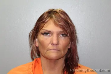 Mugshot of ANGELA HOLLIMAN booked in Custer County, Oklahoma on June 14, 2026
