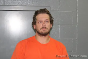 Mugshot of Justin Chase Evans booked in Custer County, Oklahoma on October 3, 2026