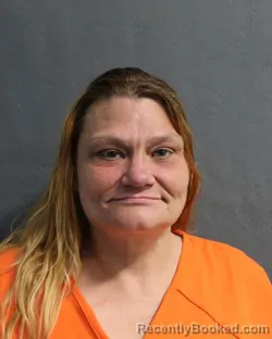 Mugshot of JENNIFER LYNN DAUZAT booked in Delaware County, Oklahoma on May 23, 2026