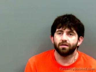 Mugshot of TYLER WAYNE BECKNELL booked in Grady County, Oklahoma on May 12, 2026