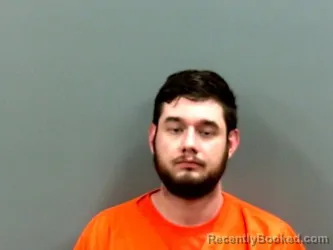 Mugshot of ASHTON MICHAEL MCCORT booked in Grady County, Oklahoma on May 14, 2026
