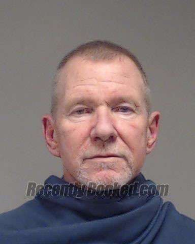 Booking photo from Collin County, Texas