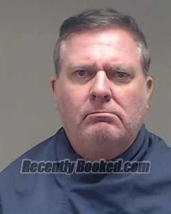 Booking photo from Collin County, Texas