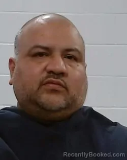 Mugshot of Jr Mendoza booked in Collin County, Texas on March 26, 2026