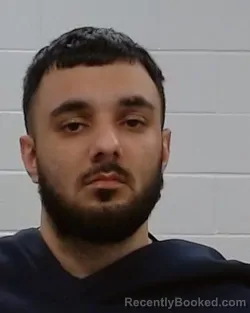 Mugshot of Noor Alam Saleem Suleman booked in Collin County, Texas on March 26, 2026