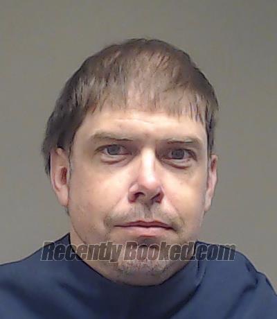 Booking photo from Collin County, Texas