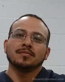 Mugshot of Errol Flint Briones booked in Collin County, Texas on March 26, 2026