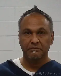 Mugshot of Manoj Mittal booked in Collin County, Texas on July 24, 2026