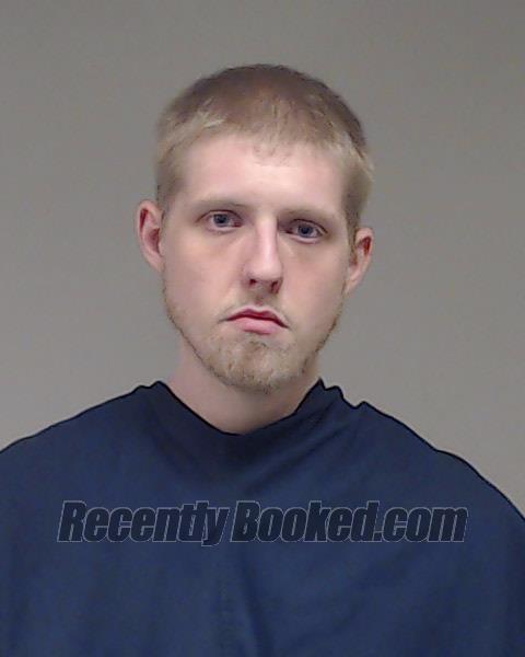 Booking photo from Collin County, Texas
