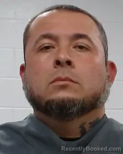 Mugshot of Jr JURADO booked in Collin County, Texas on March 18, 2026