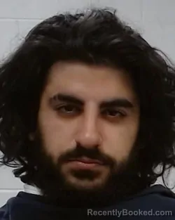 Mugshot of Jutyar Bayar Amedi booked in Collin County, Texas on March 26, 2026