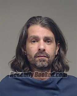 Booking photo from Collin County, Texas