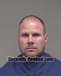 Booking photo from Collin County, Texas