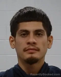 Mugshot of Orlando Flores booked in Collin County, Texas on May 12, 2026