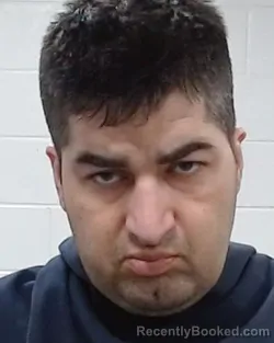 Mugshot of Ehsan Pourkohan booked in Collin County, Texas on March 30, 2026