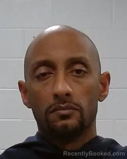 Mugshot of Jr Assefa booked in Collin County, Texas on May 11, 2026