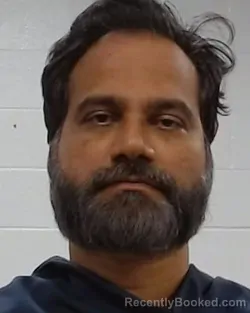 Mugshot of Sanjay Sachithanandham booked in Collin County, Texas on May 28, 2026