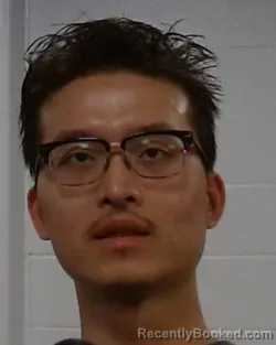 Booking photo from Collin County, Texas