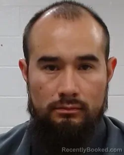 Mugshot of Rolando Macareno