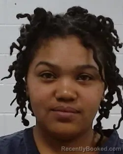 Mugshot of Kenya Victoria Moore booked in Collin County, Texas on March 14, 2026