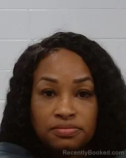 Mugshot of Rochelle Moore booked in Collin County, Texas on March 14, 2026