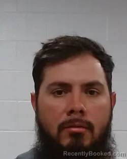 Mugshot of Christopher Carlos Cruz booked in Collin County, Texas on March 14, 2026