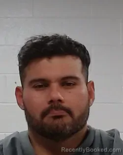 Mugshot of Edward Edmundo Lugo Revilla booked in Collin County, Texas on March 14, 2026