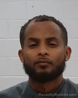 Mugshot of Michael Tekalgn Samuel booked in Collin County, Texas on March 16, 2026