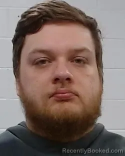 Mugshot of Justin Mitchell Schiegg booked in Collin County, Texas on March 18, 2026