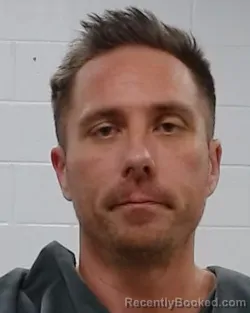 Mugshot of Adam Wayne Holman booked in Collin County, Texas on March 18, 2026