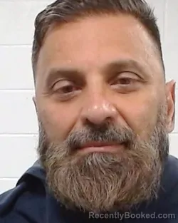 Mugshot of John Augustus booked in Collin County, Texas on March 28, 2026