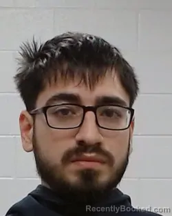 Mugshot of Frank Menchon booked in Collin County, Texas on March 31, 2026