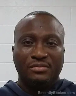 Mugshot of Olutope Amos Bankole booked in Collin County, Texas on April 1, 2026