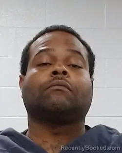 Mugshot of JOHN EARL MOORE booked in Collin County, Texas on April 2, 2026