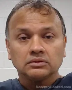 Mugshot of Zayat Amir Haque booked in Collin County, Texas on May 24, 2026