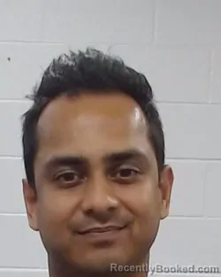 Mugshot of Abir Rahman booked in Collin County, Texas on July 12, 2026