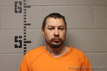 Mugshot of JOSHUA LEE SWANTEK booked in Logan County, Oklahoma on March 23, 2026