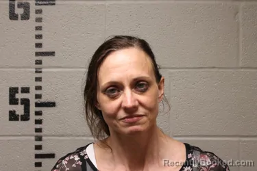 Mugshot of JENNIFER JOAN JOHNSON booked in Logan County, Oklahoma on April 14, 2026