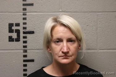 Mugshot of ASHLEY MCCRAY PLEMONS booked in Logan County, Oklahoma on May 7, 2026