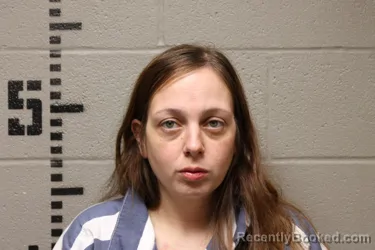 Mugshot of PAIGE DANIELLE DELISA booked in Logan County, Oklahoma on May 8, 2026
