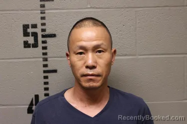 Mugshot of LUO GUOMING booked in Logan County, Oklahoma on June 30, 2026
