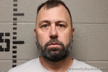 Mugshot of DOUGLAS GEORGE KEMNA booked in Logan County, Oklahoma on August 4, 2026