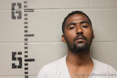 Mugshot of Nkosi Kishwa Mwalimu Ajanaku booked in Logan County, Oklahoma on August 31, 2026
