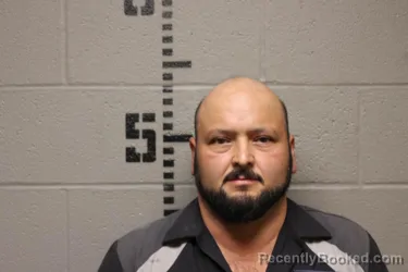 Mugshot of Carlos Rubio De Santiago booked in Logan County, Oklahoma on September 10, 2026